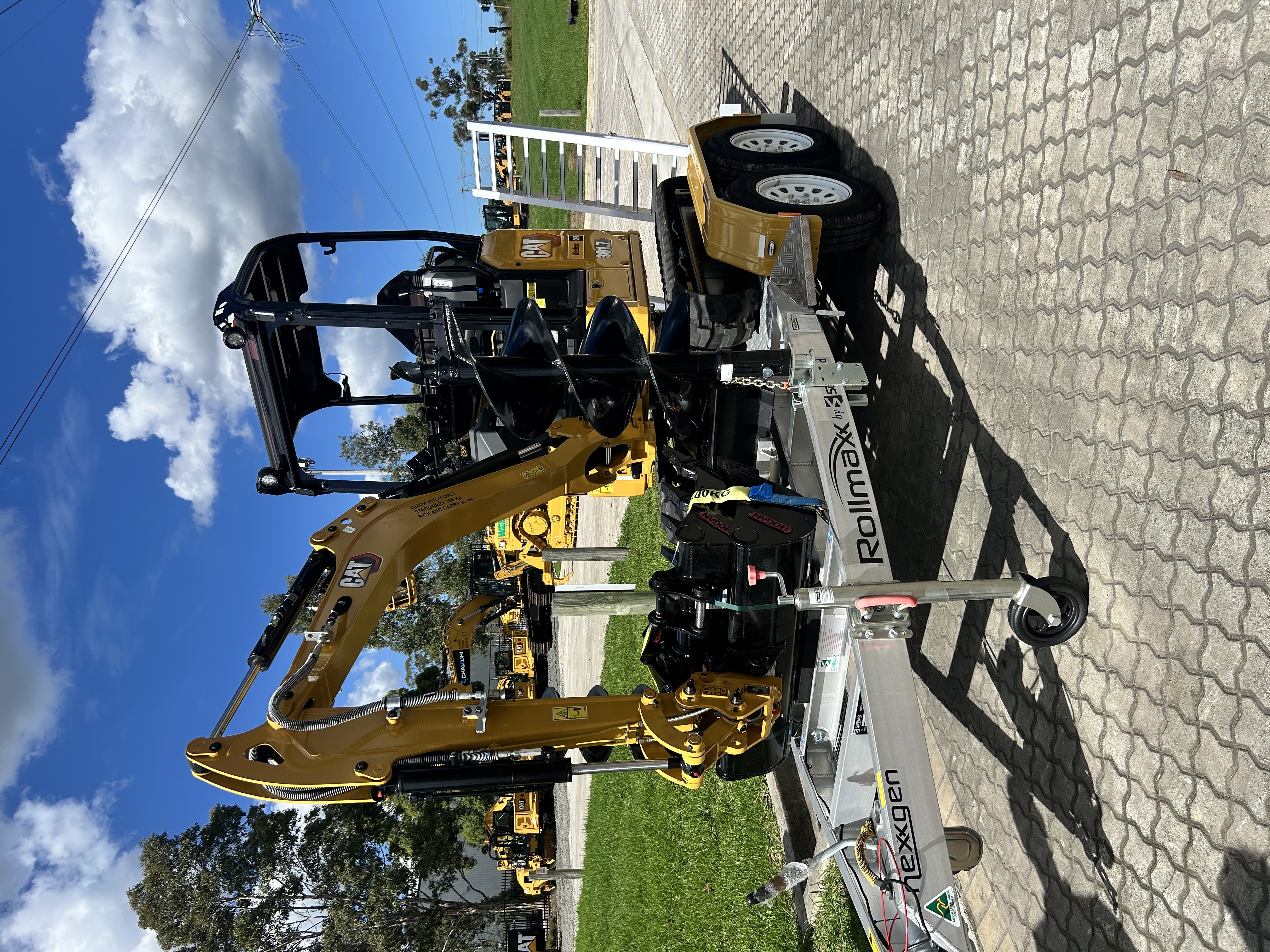 CAT mini excavator on trailer